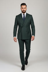 Man wearing green pinstripe double-breasted suit with tailored fit for formal occasions.